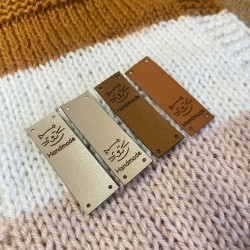 Sew-on eco-leather tag 6x2cm